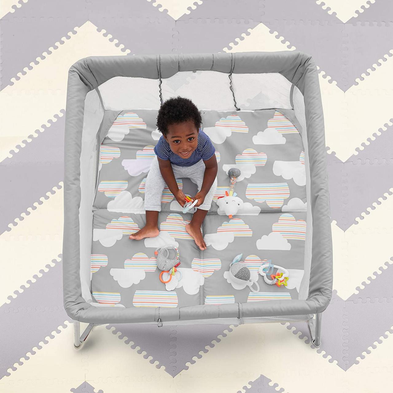 Skip hop play sales to night travel crib